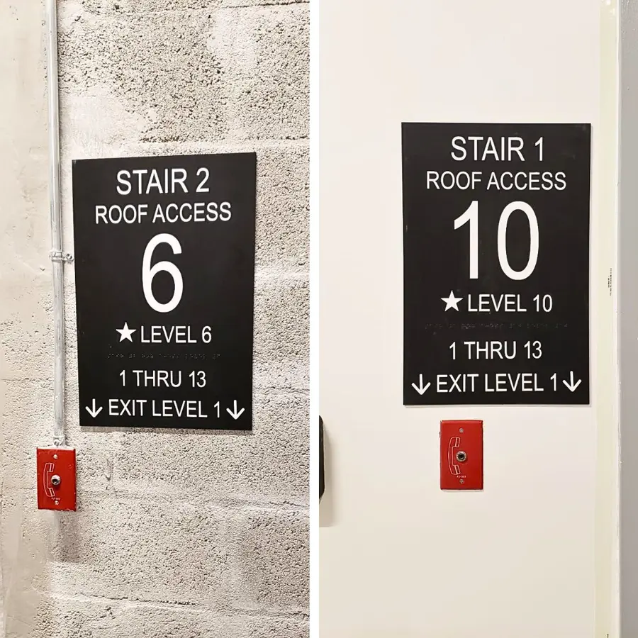ADA stairwell signs for Stair 2 and Stair 1 on a block wall