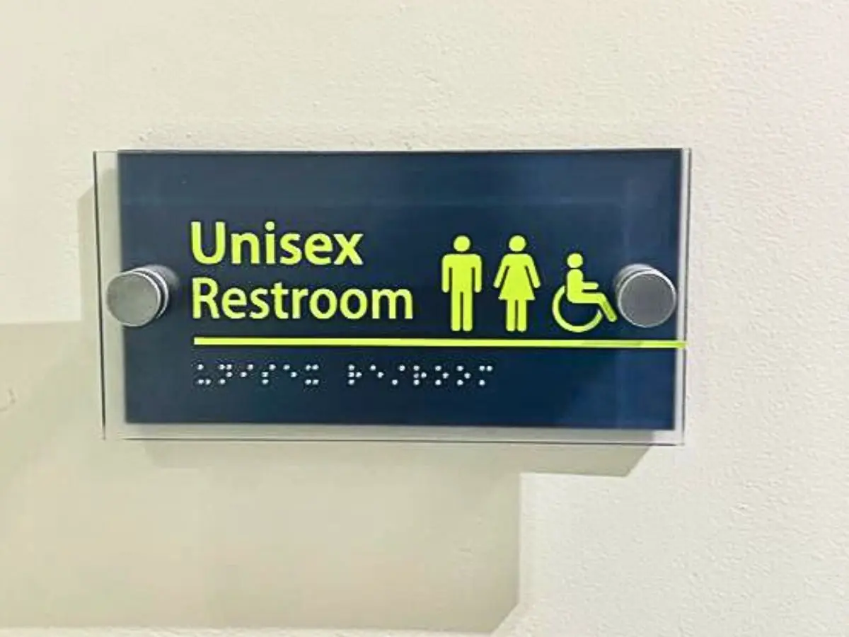 ADA-compliant restroom sign with braille