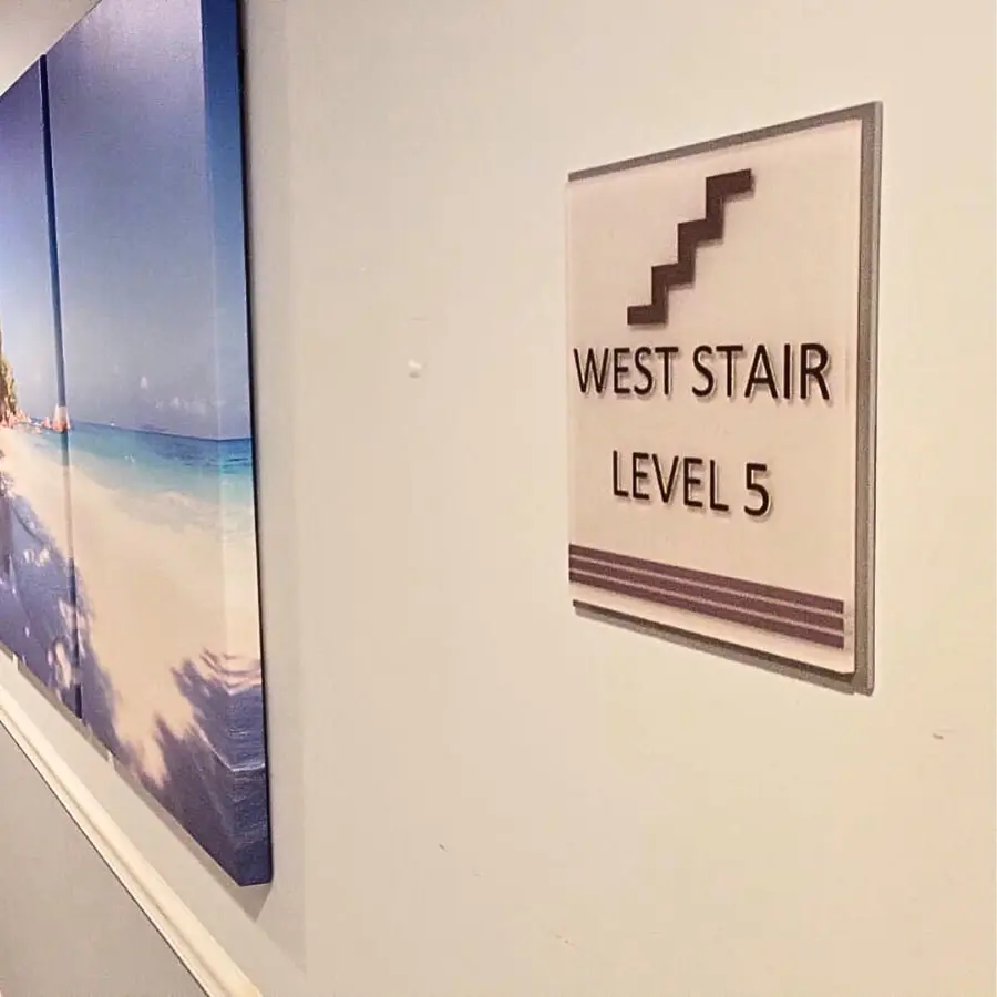 ADA stairwell sign: West Stair, Level 5