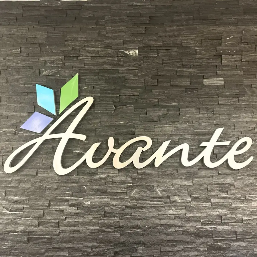 Avante letters on a stone lobby wall