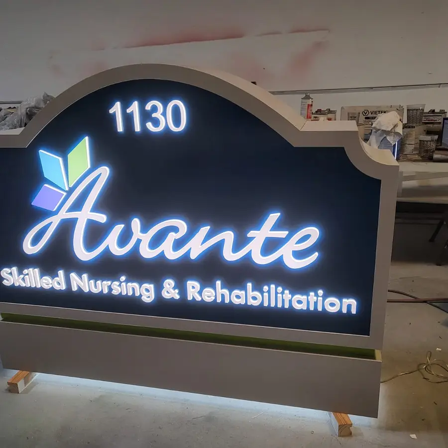 Avante monument sign lit up in the shop before delivery