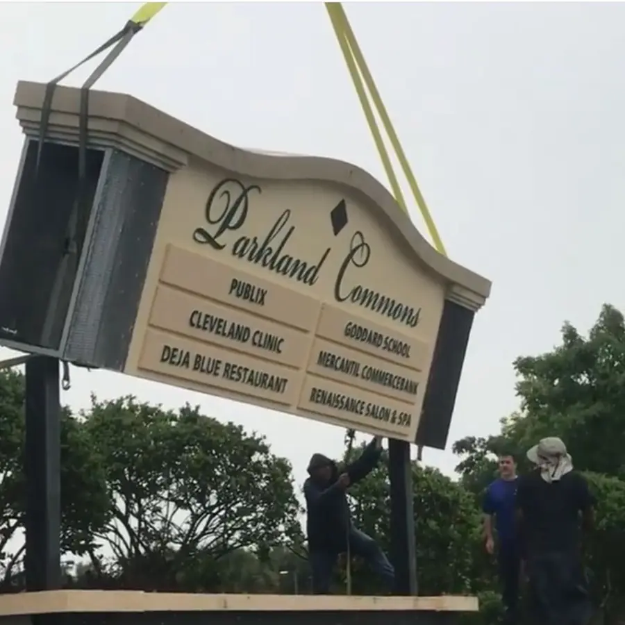 Parkland Commons pylon sign being lifted by crane