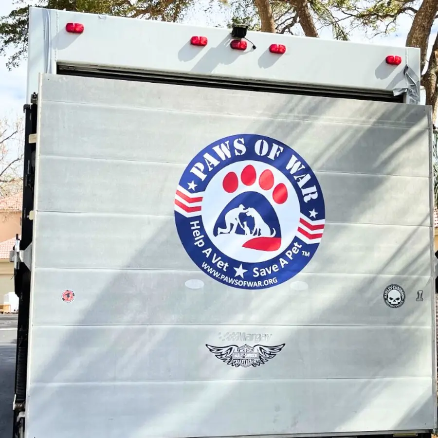 Paws of War lettering on a box truck