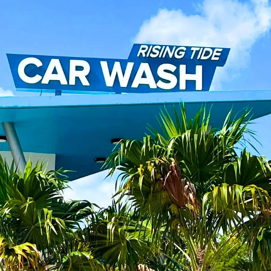 Illuminated cabinet sign at a car wash